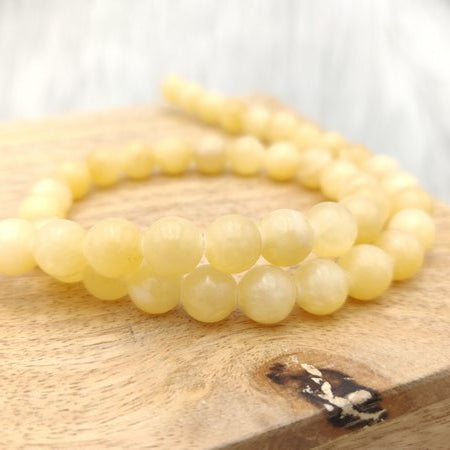Calcite jaune - Fil de perles rondes